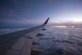 Air Asia Aeroplane Wing During Beautiful Sunrise. Royalty Free Stock Photo