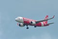 Air Asia Airbus A320 landing at Changi Airport