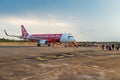 Air Asia's Airbus plane loading passenger