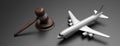 Air aviator Law. Plane and judge gavel on gray black background, banner. 3d illustration