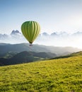 Air ballon above mountains at the summer time.