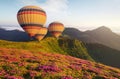 Air ballon above mountains at the summer time.