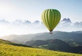 Air ballons above mountains at the summer time. Royalty Free Stock Photo