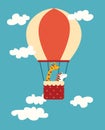 Air balloon animals print. Giraffe and zebra in a balloon in the sky with clouds