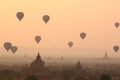 air balloons over Buddhist temples at sunrise. Bagan, Myanmar. Royalty Free Stock Photo