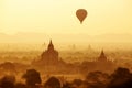 Air balloons over Buddhist temples at sunrise. Bagan, Myanmar. Royalty Free Stock Photo