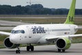 AirBaltic jet plane taxiing in airport