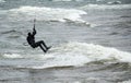 Air borne kite boarder on Lake Michigan