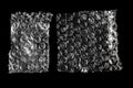 Air bubble packaging film on black background Royalty Free Stock Photo