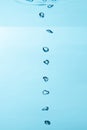 Air bubble and water splash,Water splash isolated on blue background Royalty Free Stock Photo