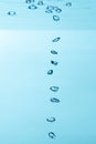 Air bubble and water splash,Water splash isolated on blue background Royalty Free Stock Photo