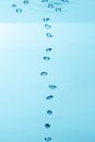 Air bubble and water splash,Water splash isolated on blue background Royalty Free Stock Photo