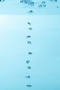 Air bubble and water splash,Water splash isolated on blue background Royalty Free Stock Photo