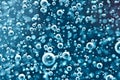 Air bubbles in blue water. Macro Royalty Free Stock Photo