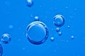 Air bubbles in blue water. Macro Royalty Free Stock Photo