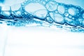 Air bubbles in blue water Royalty Free Stock Photo