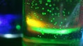 air bubbles formed in the green liquid.tiny potion bottle Royalty Free Stock Photo