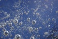 Air bubbles in the ice lit by the sun Royalty Free Stock Photo