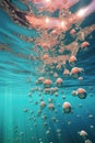 air bubbles rising in clear blue water Royalty Free Stock Photo