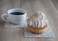 Air cake in a basket with a cup of coffee Royalty Free Stock Photo