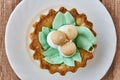 Air cake in a basket on a wooden background