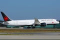 Air Canada plane flying up in the sky Royalty Free Stock Photo