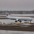 Air Canada Boeing 777-300 standing at Montreal Airport