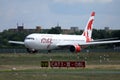 Air Canada Rouge taxiing on the runway