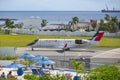 Airplane flying over Maho Beach, Sint Maarten, Dutch Caribbean