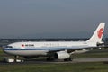 Air China plane being towed at Frankfurt Airport FRA