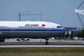 Air China plane taxiing on runway, Amsterdam Airport Schiphol AMS