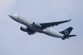 Air China Star Alliance airplane taking off from airport