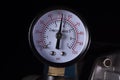 Air compressor manometer close-up. Pressure gauge measurement
