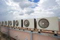 Air compressors on roof of factory