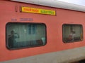 Air conditioned first class train coach of Rajdhani Express at the main platform of Railway station. Royalty Free Stock Photo