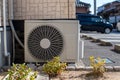 Air conditioner compressor outside the house Royalty Free Stock Photo