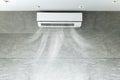 Air conditioner blowing cold air in the room Royalty Free Stock Photo