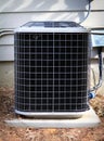 Air Conditioner Condenser beside a house