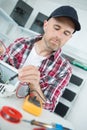 Air conditioner repair man at work Royalty Free Stock Photo