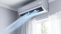 Air conditioner unit on a wall with cool air blowing. Indoor climate control and cooling concept. Design for advertisement and Royalty Free Stock Photo