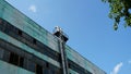 industrial air conditioner. Air conditioner units HVAC on a roof of industrial building with blue sky and clouds in the Royalty Free Stock Photo