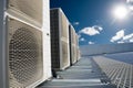 Air conditioner units with sun and blue sky Royalty Free Stock Photo
