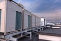 Air conditioner units VRV HVAC, big fan and a water cooler on a roof of new industrial building Royalty Free Stock Photo