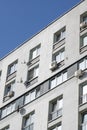 Air conditioners on wall of tall building