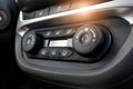 Air conditioning button inside a car. Climate control unit in the new car. Modern car interior details. Car detailing. Selective Royalty Free Stock Photo