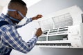 Air Conditioning Checking And Filter Cleaning Royalty Free Stock Photo