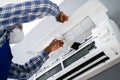 Air Conditioning Checking And Filter Cleaning Royalty Free Stock Photo