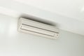 Air conditioning Installed on a white concrete wall in the house. Royalty Free Stock Photo