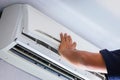 Air Conditioning Repair, Repairman fixing air conditioning system, Male technician service for repair and maintenance of air Royalty Free Stock Photo