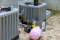 Air conditioning repair system model is actual on a compressor refueling the air conditioner with freon Royalty Free Stock Photo